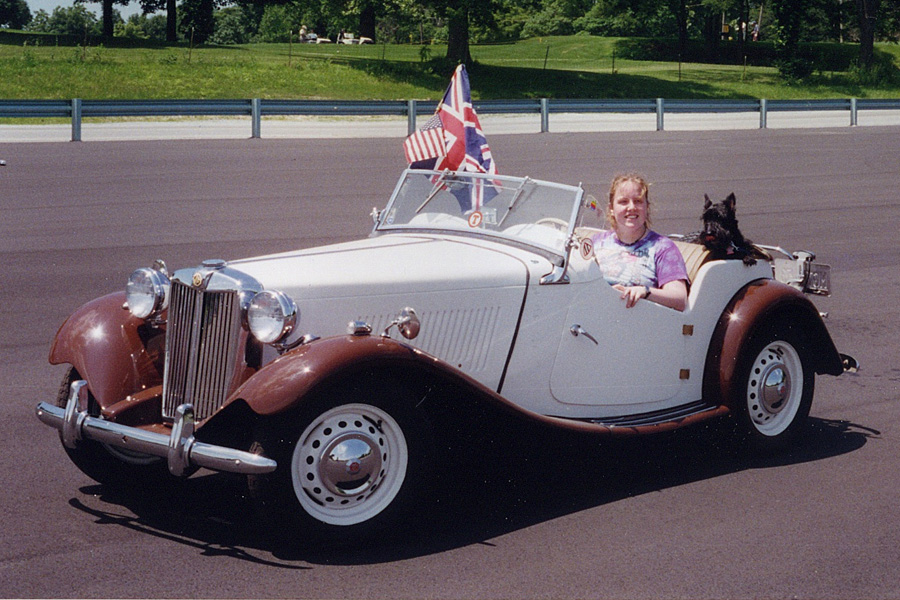Peg and Scotty in the MG
